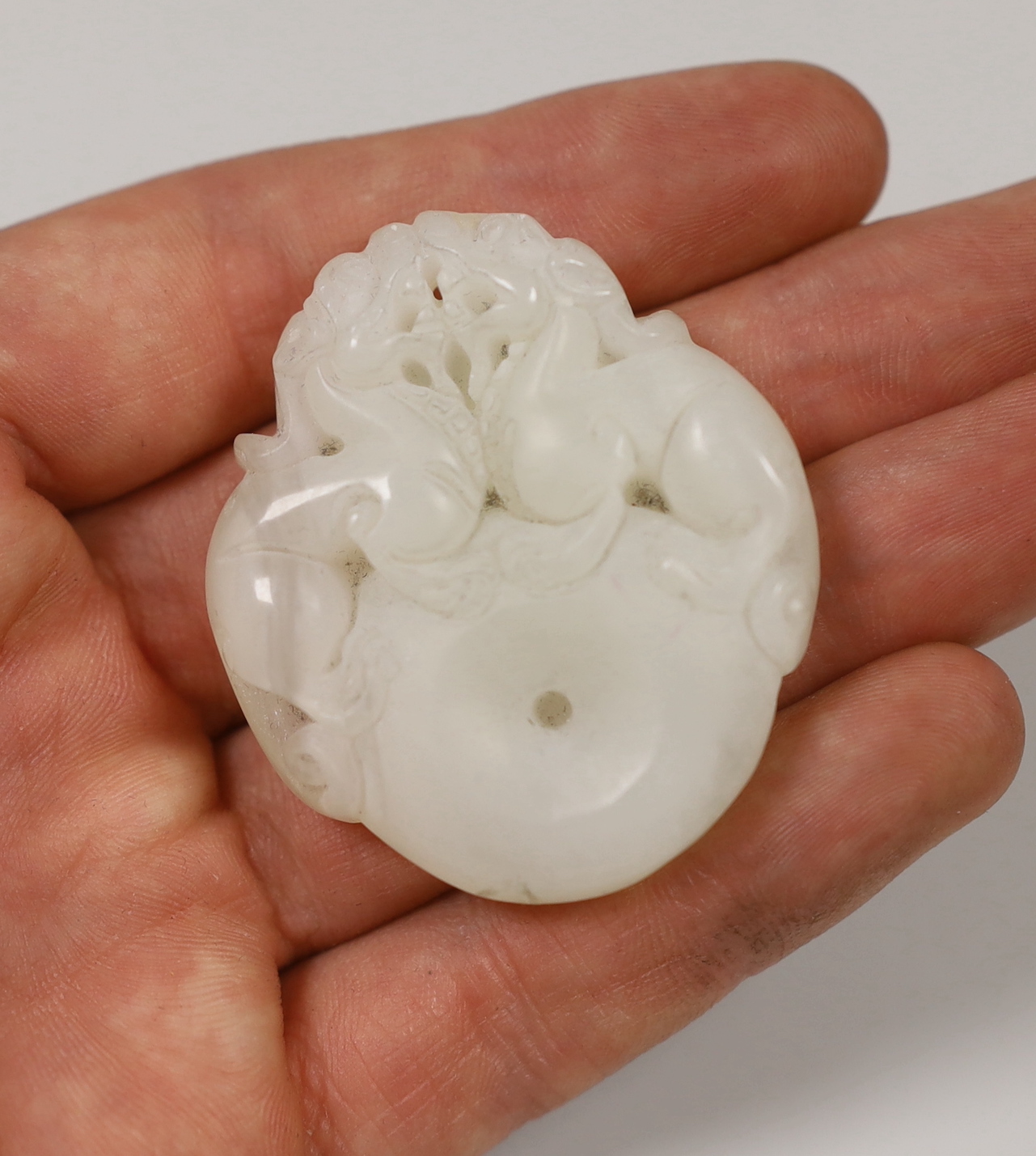 A collection of 10 various Chinese jade/hardstone carvings